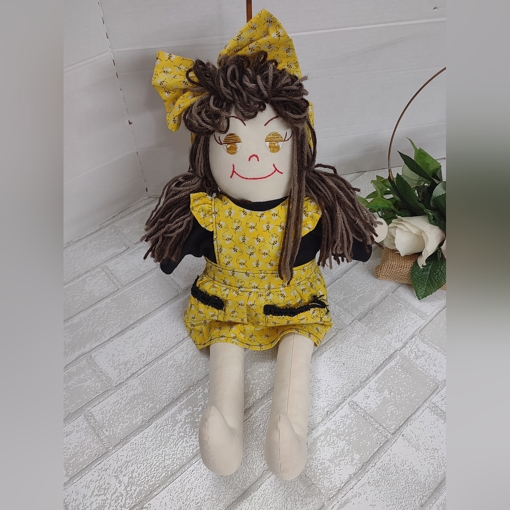 Adorable Yellow Floral Doll with Bow